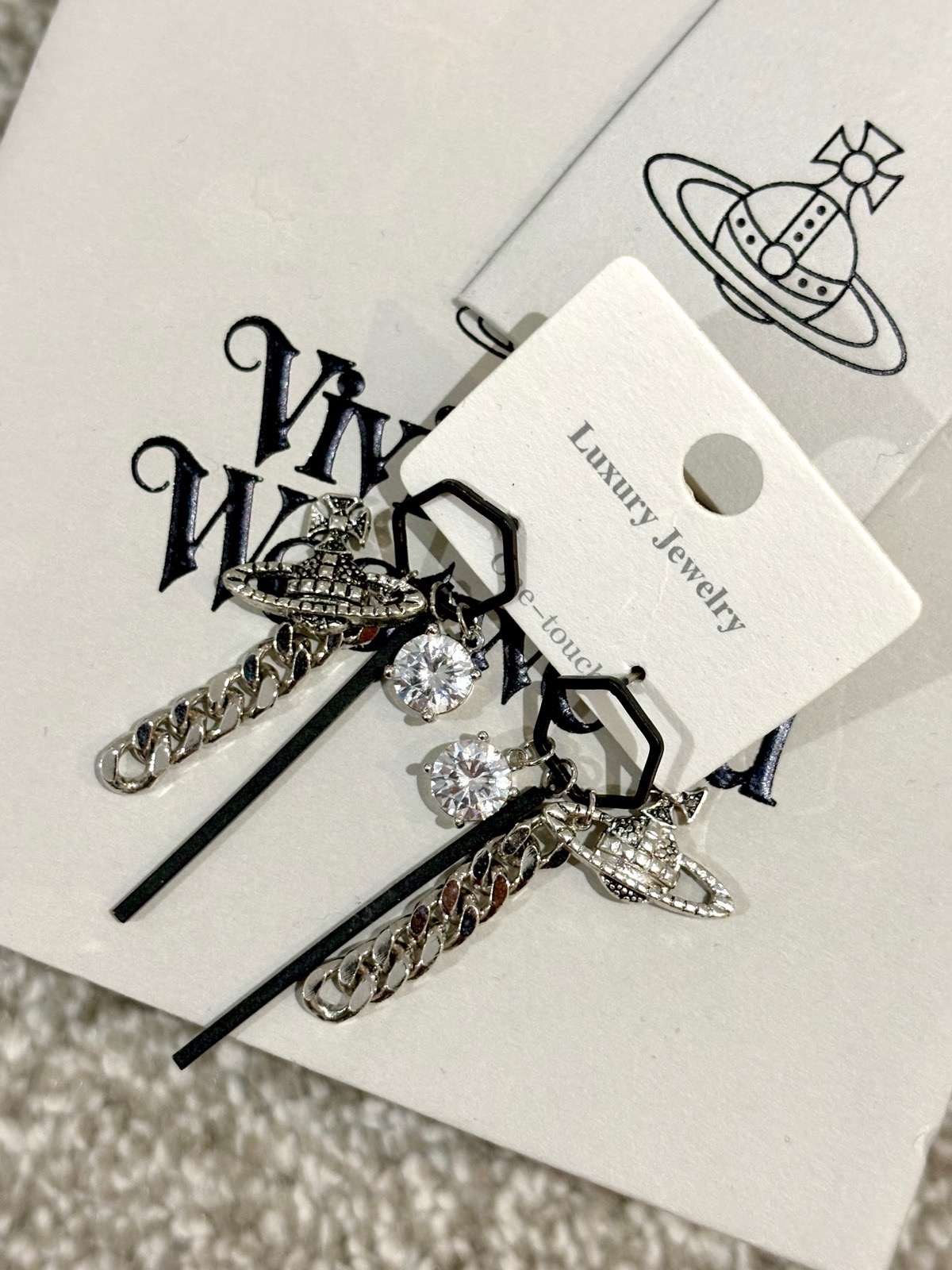 Crystal with silver charms earrings