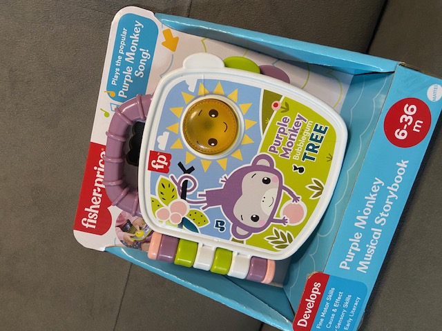 Fisher-Price Purple Monkey Musical Storybook – Interactive Baby Toy