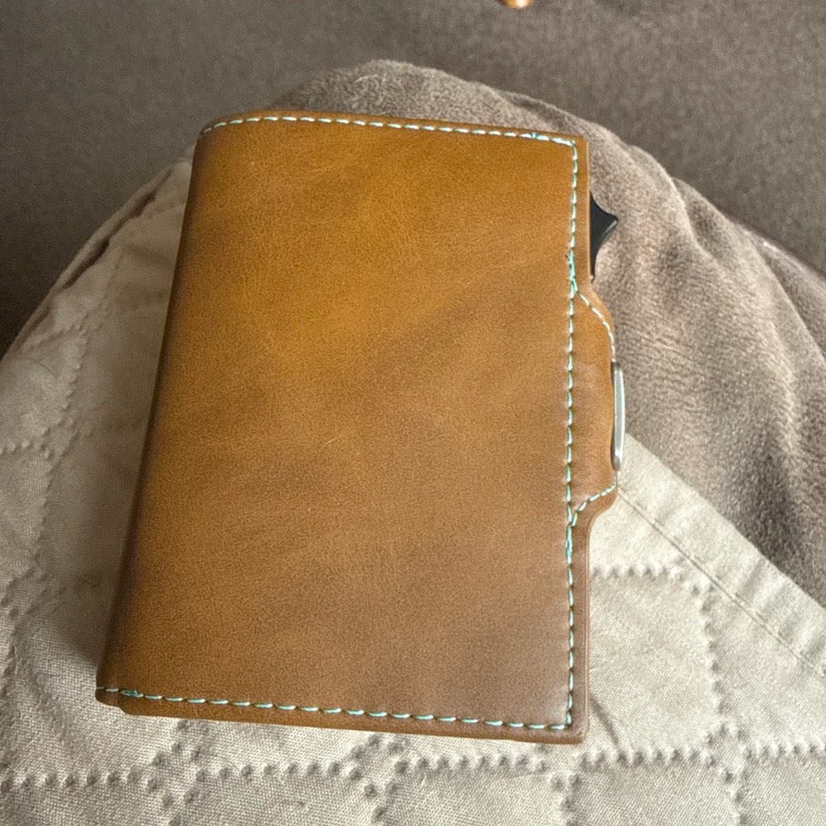 Men’s Brown leather bifold wallet pop up for cards