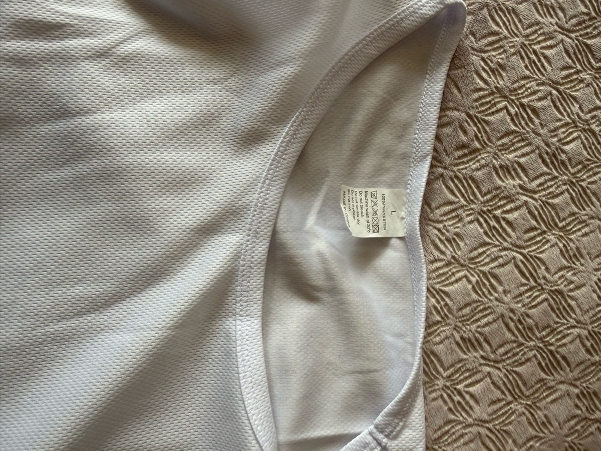 X2 cool white vests 100% polyester bnwot