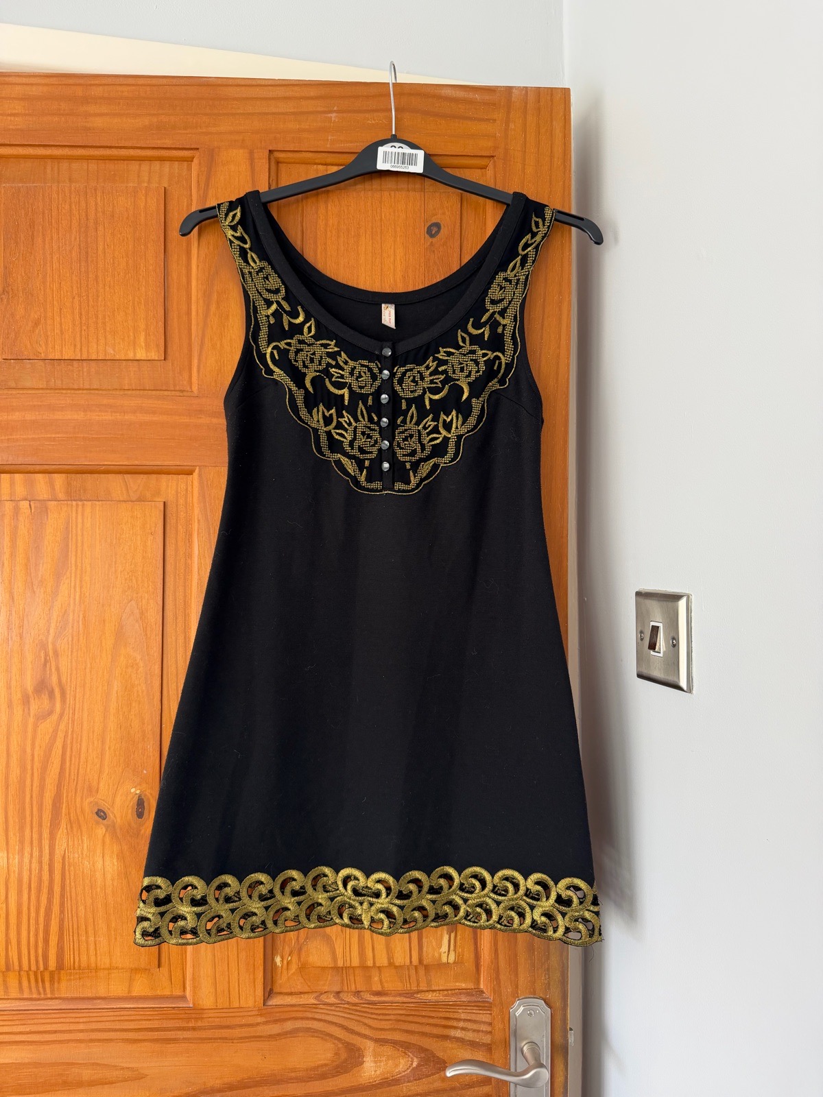 Free people black and gold mini dress size small