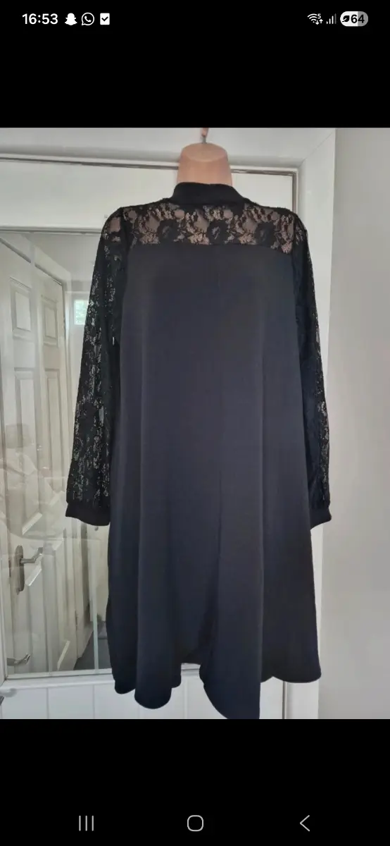 Ladies black shift dress with lace sleeves. Size 20