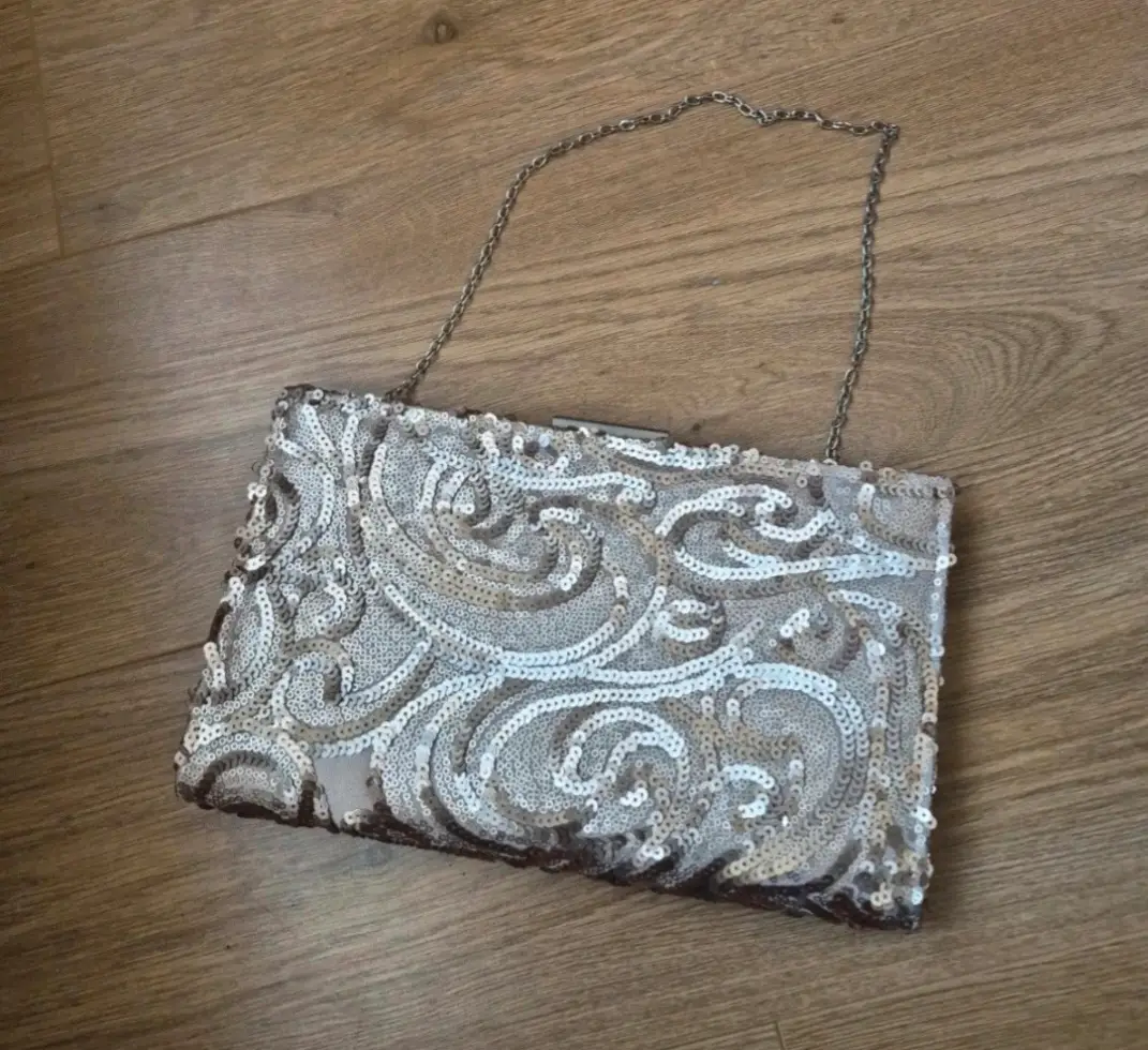 Champagne sequin clutch bag with chain strap