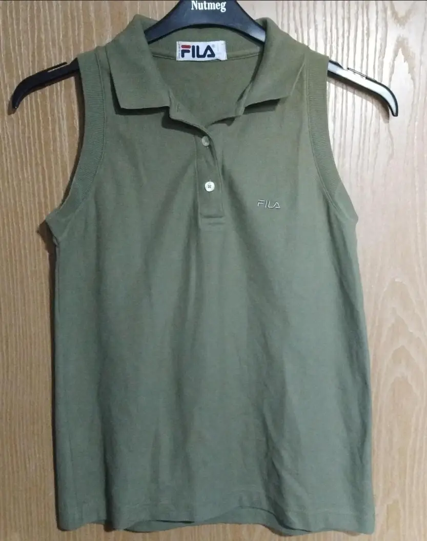 Ladies fila olive green sleeveless polo shirt. Size S