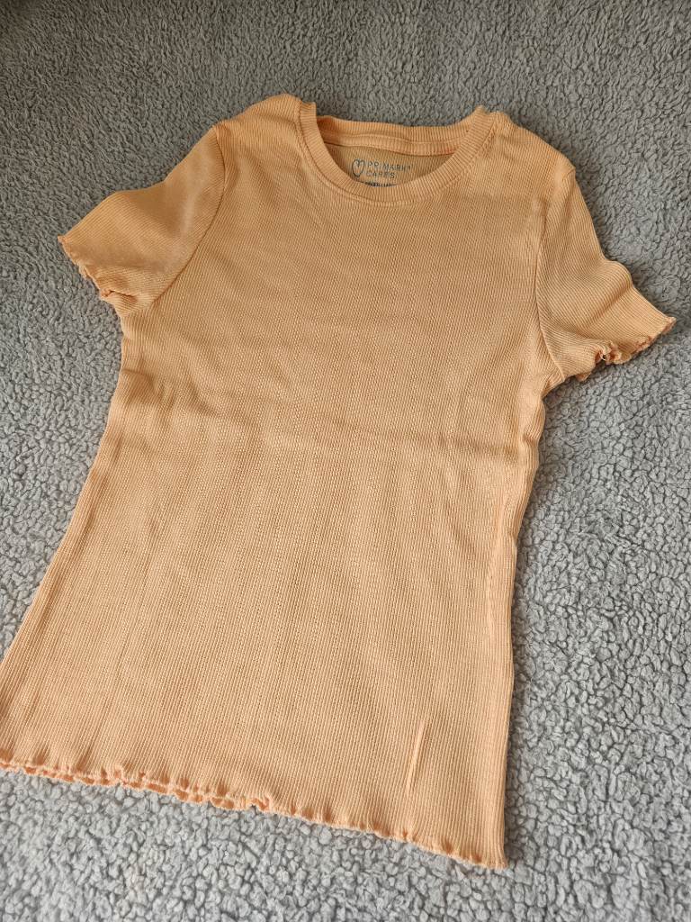 Girls coral tshirt Size 10-11 Years