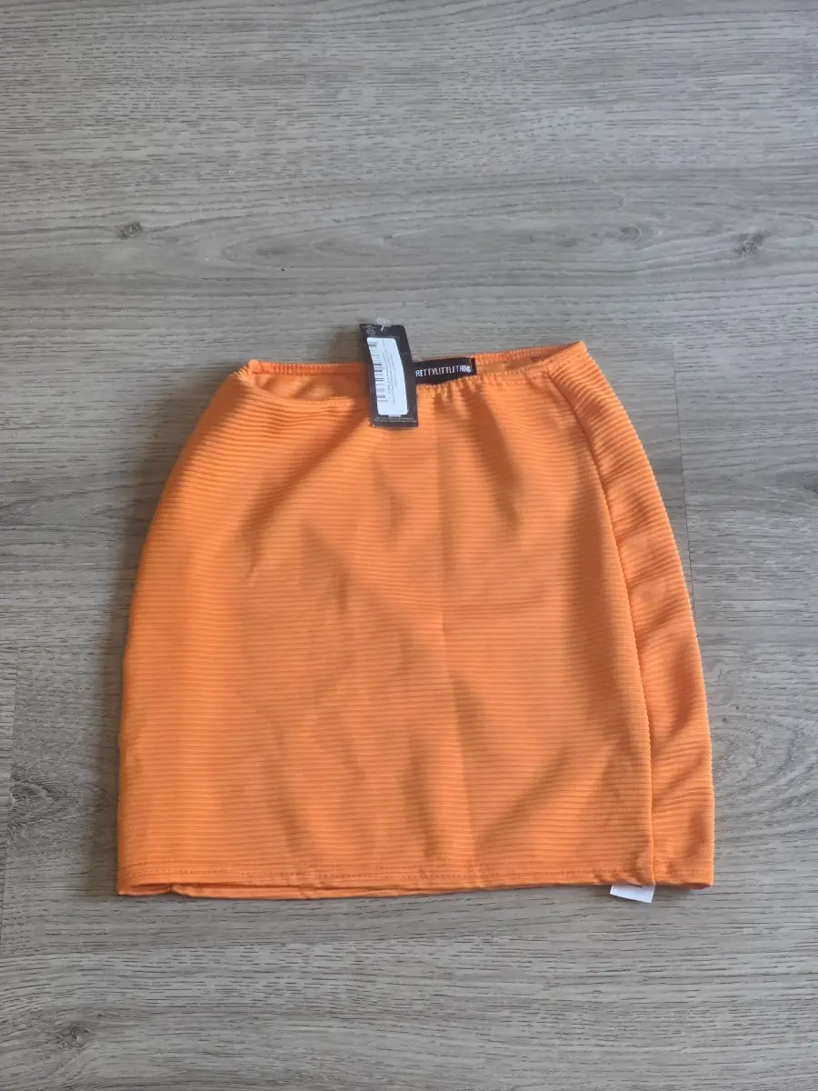 Orange Ribbed Shape Mini Skirt