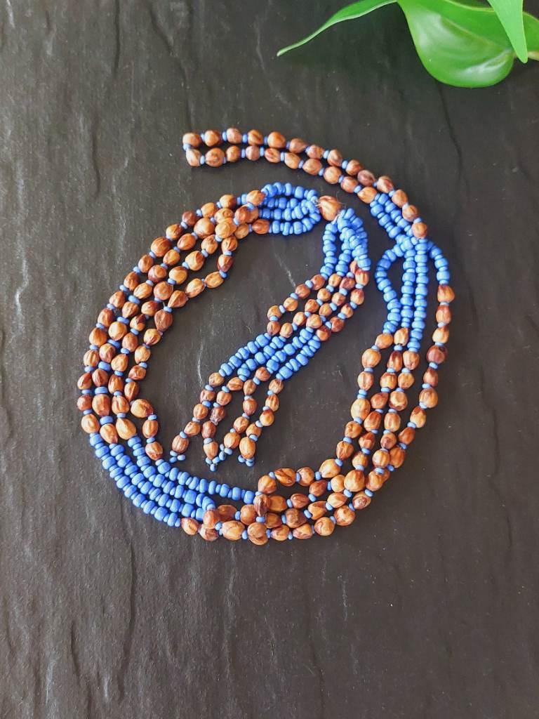 Vintage 1970s Handmade Seed & Blue Glass Bead Necklace With Tassel Boho Tribal