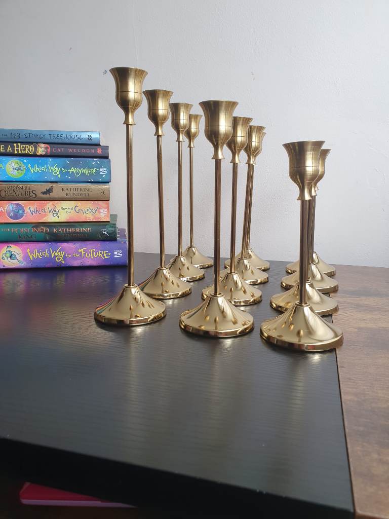 12 lightweight metal bell-shaped candle holders