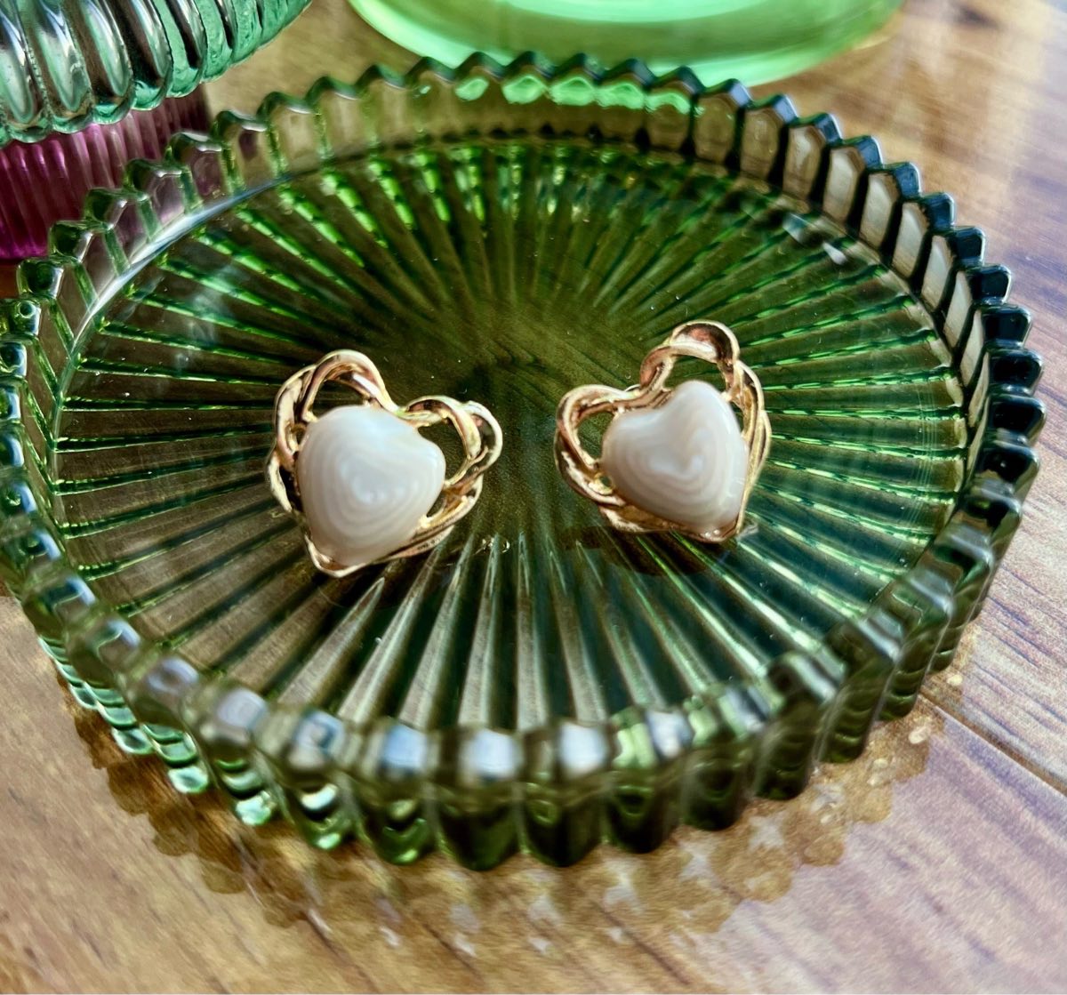 Heart shaped gold plated resin stud earrings