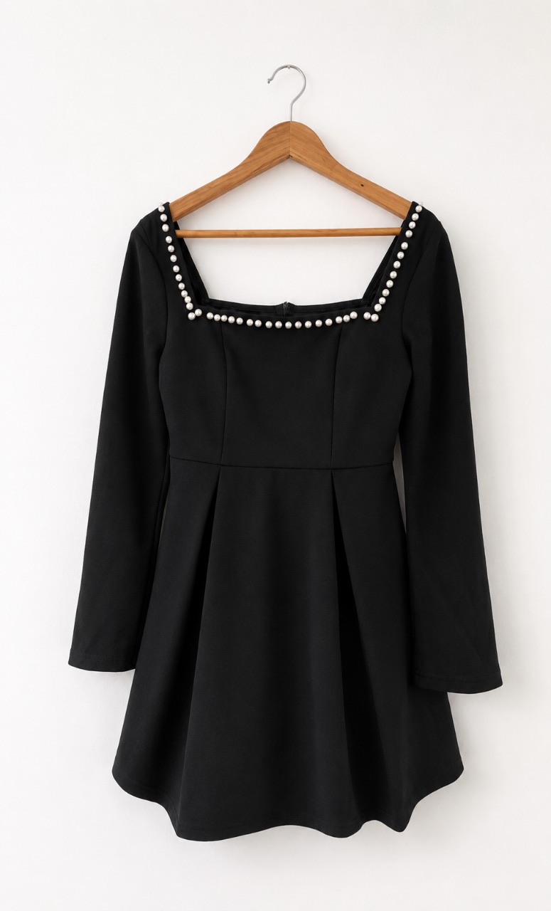 Elegant black mini dress with pearl detail neckline and flattering skater fit. Size :M