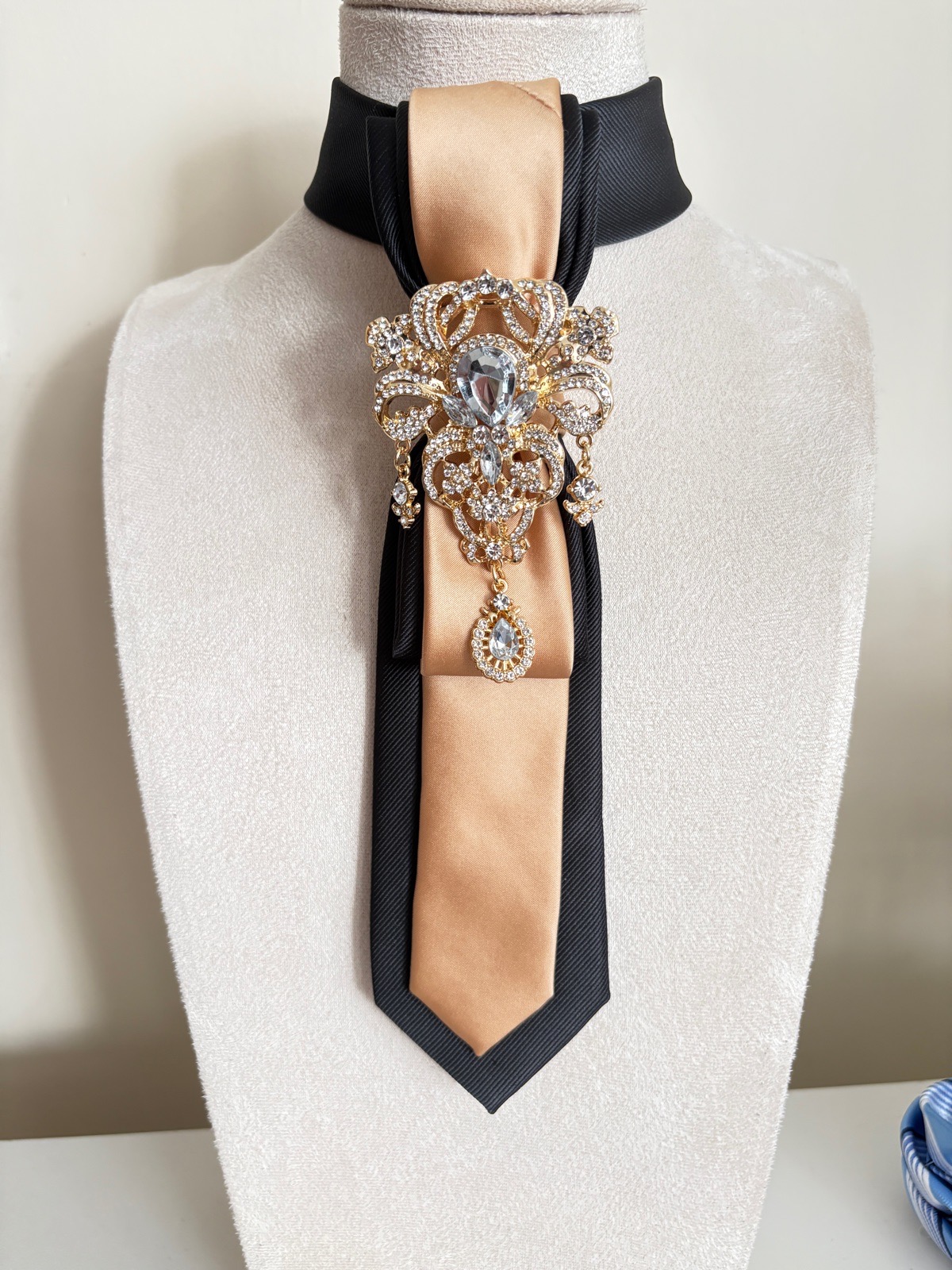 Gold & Black tie with brooch