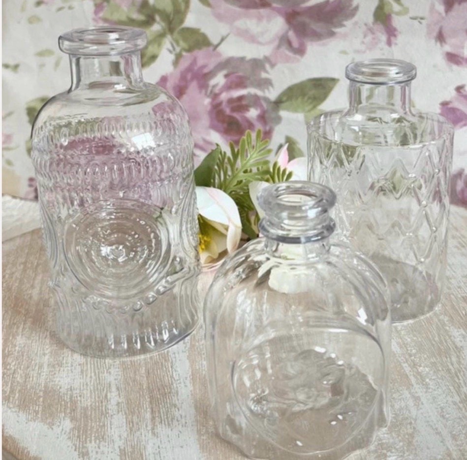 3 plastic mini bottles bud vases