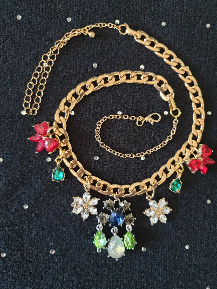 Bold and beautiful multi-coloured gem necklace on a lovely gold-tone curb chain.