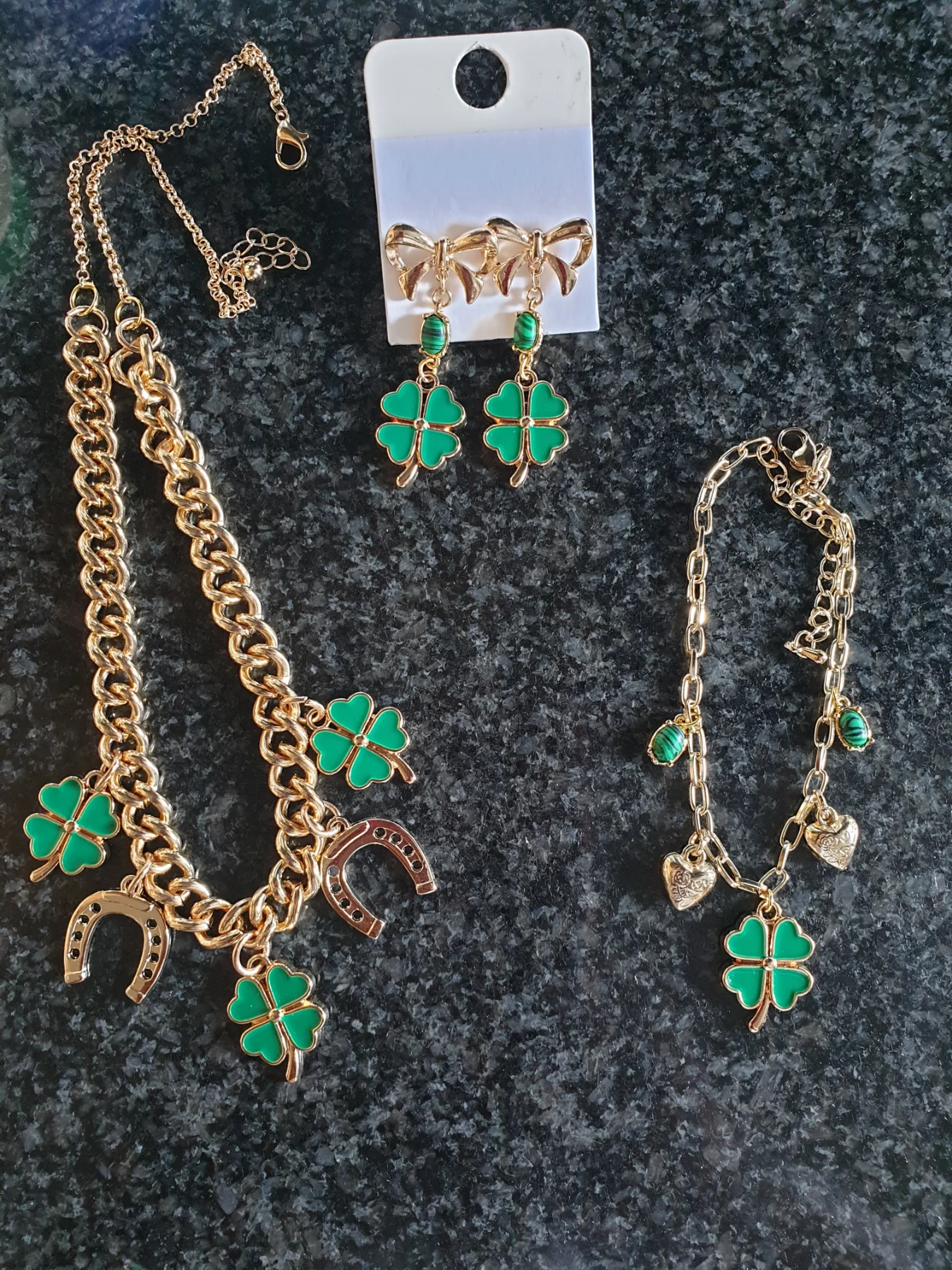 Green shamrock jewellery set with gold accents. New.