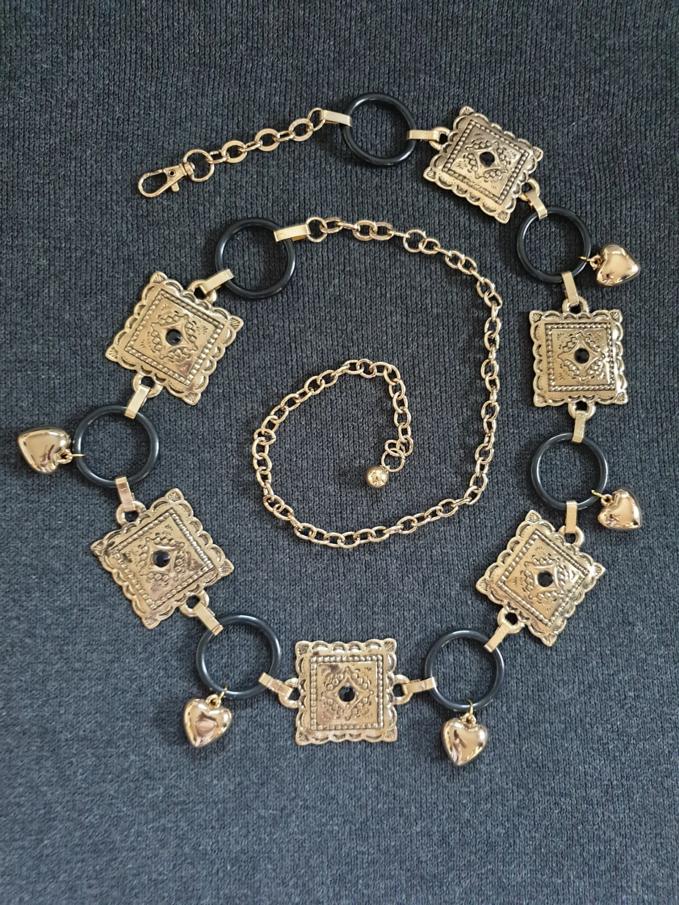 Gold & black square charm adjustable chain belt with heart pendants.