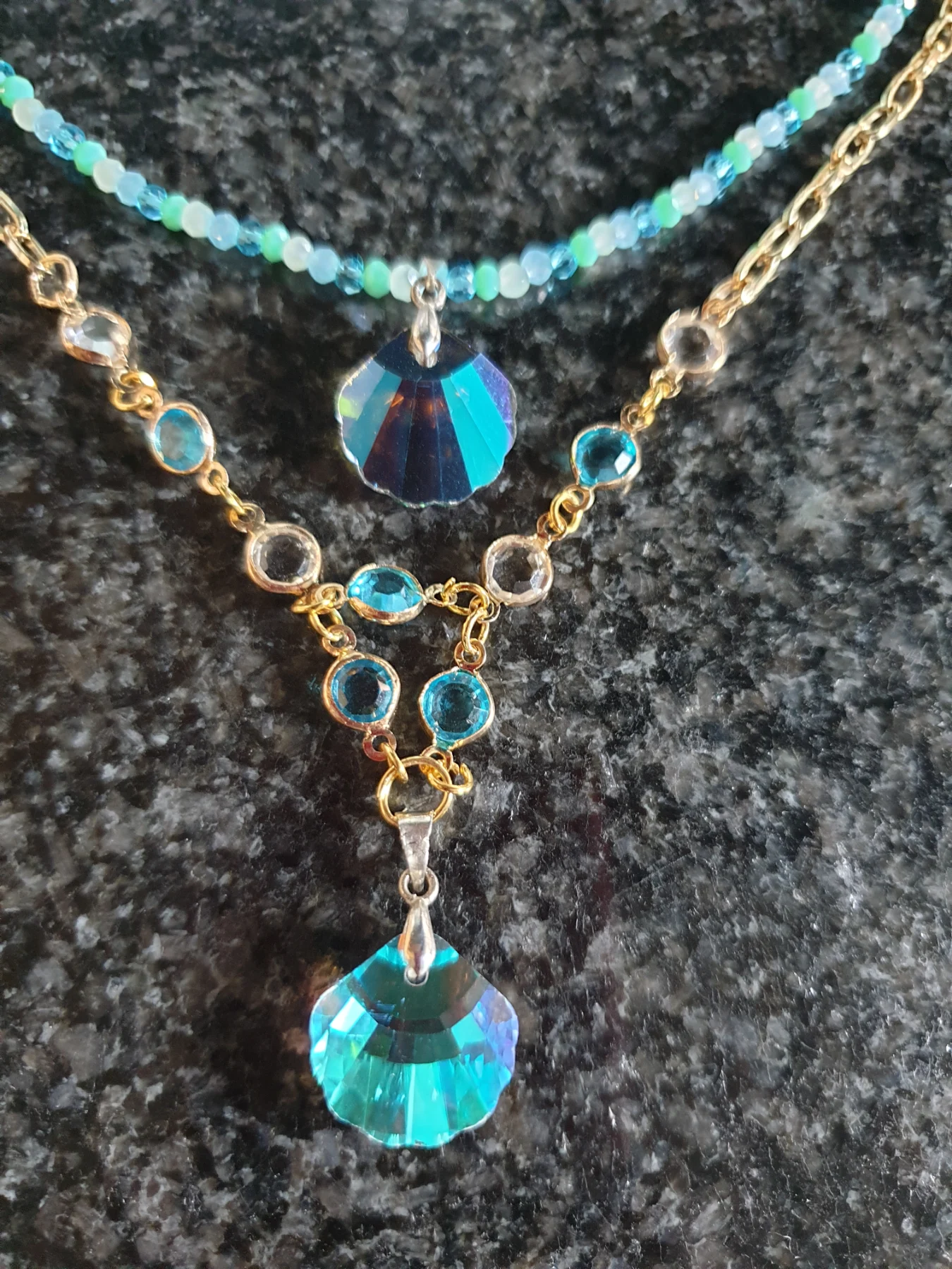 Light blue and gold double-layer necklace. New