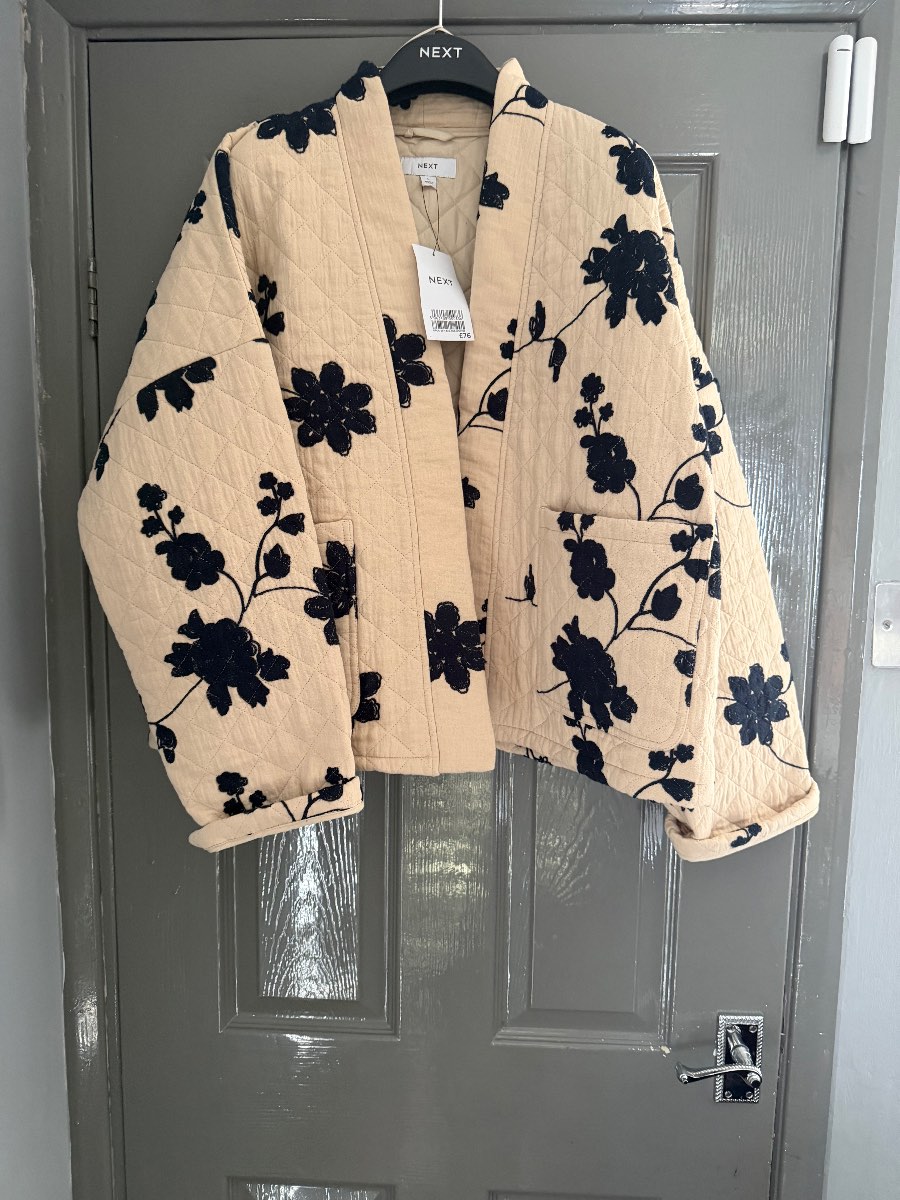 Ecru and black patterned  quilted jacket