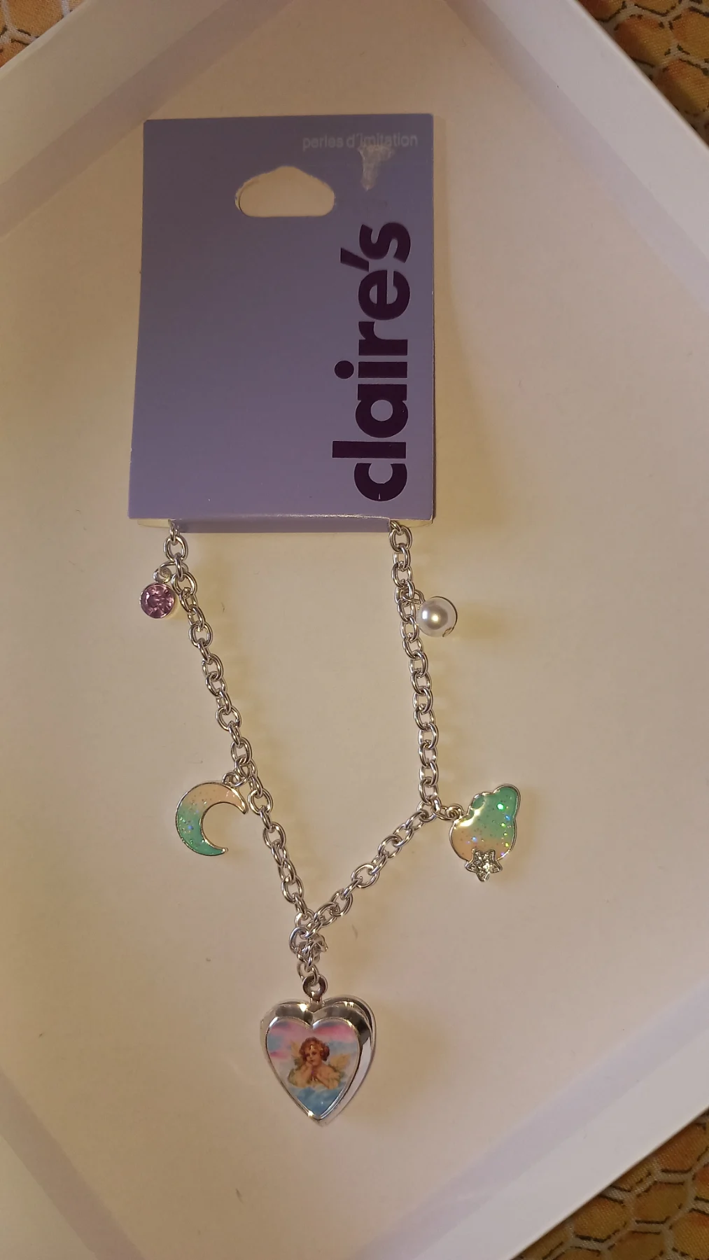 Locket/ charm bracelet claire's