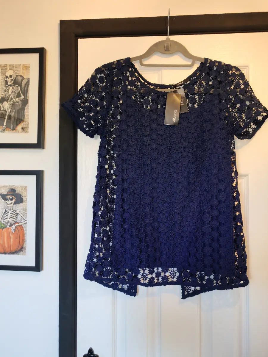 blue vest top and crochet style top