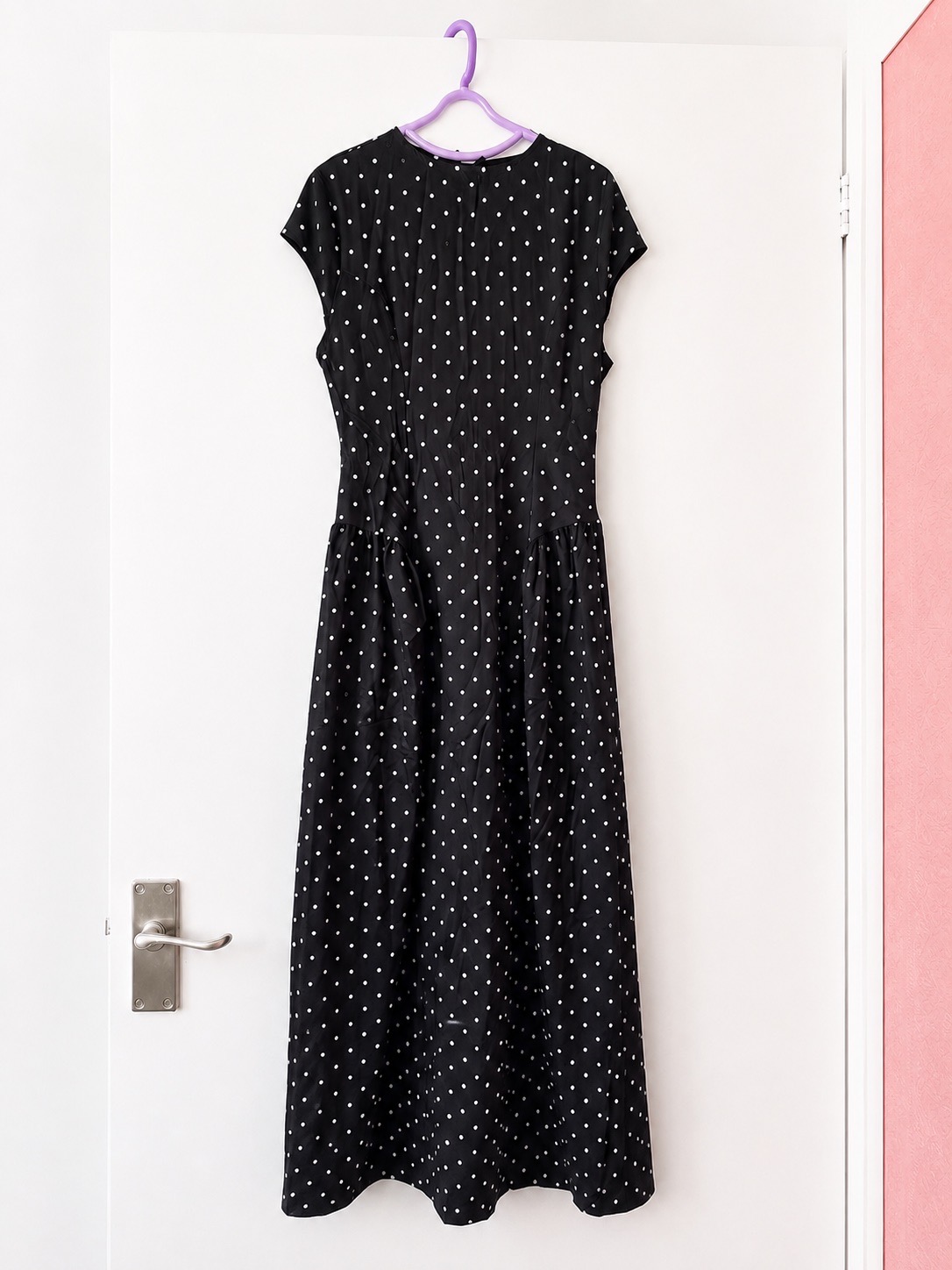 Black and white polka-dot maxi dress in size M.
