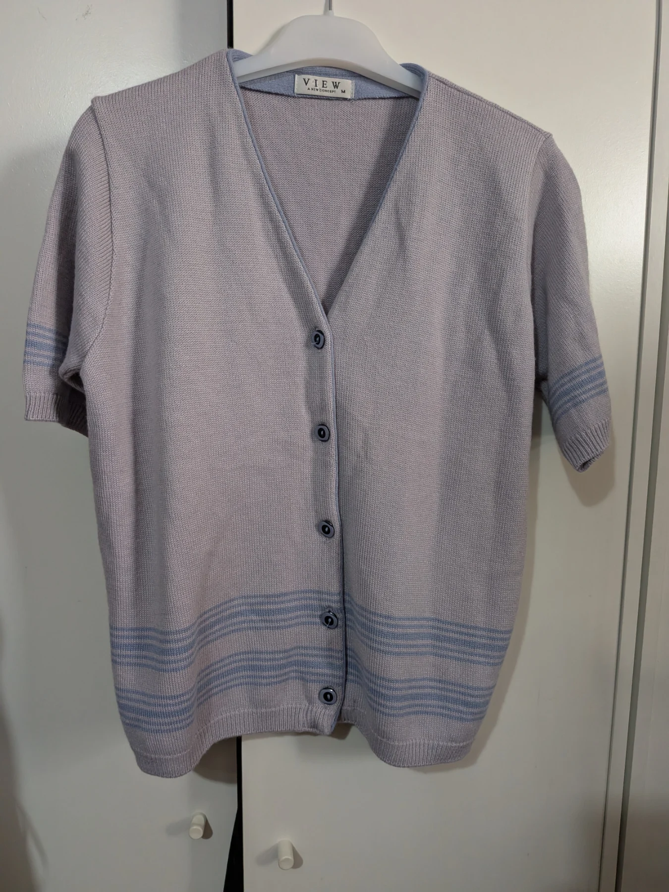Woman's short sleeved cardigan size medium