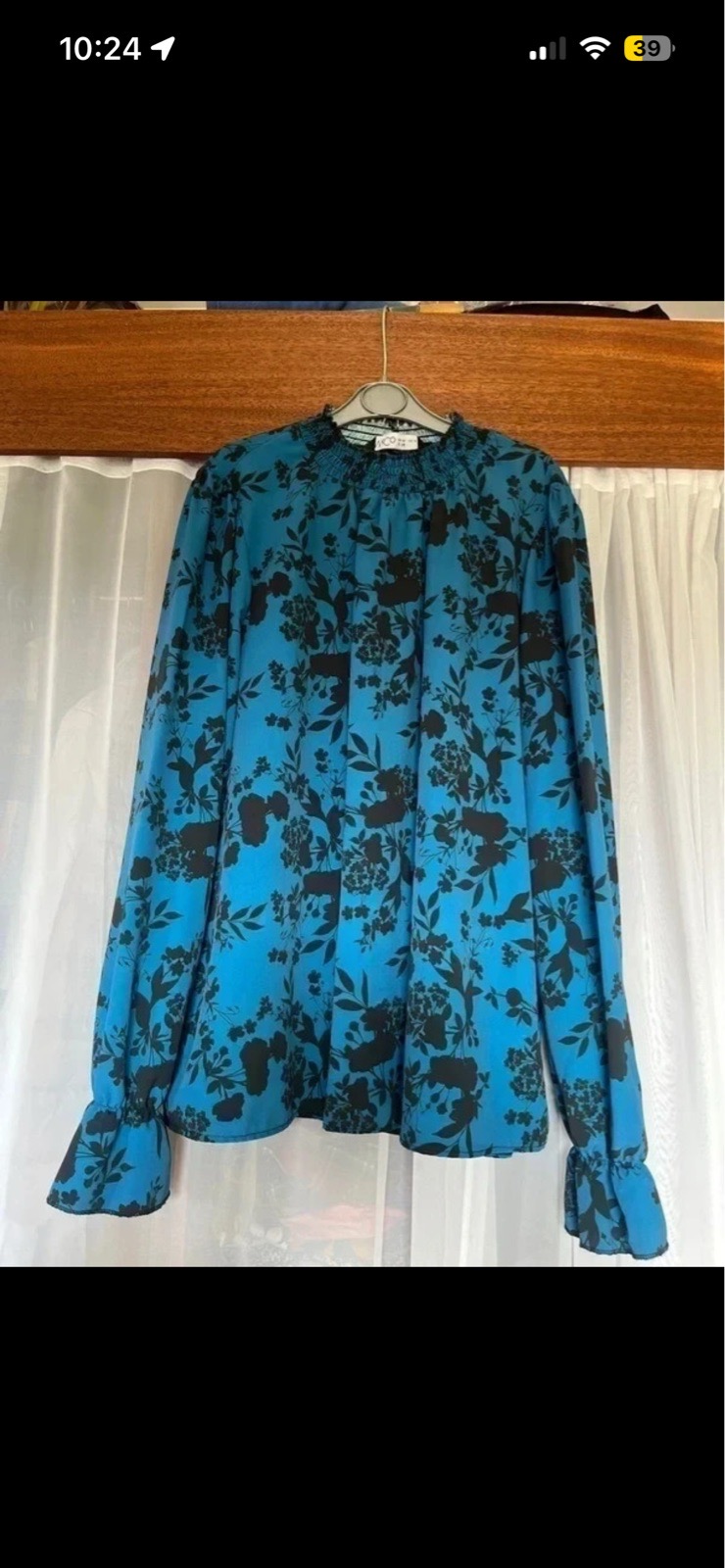 Patterned blue blouse size 18