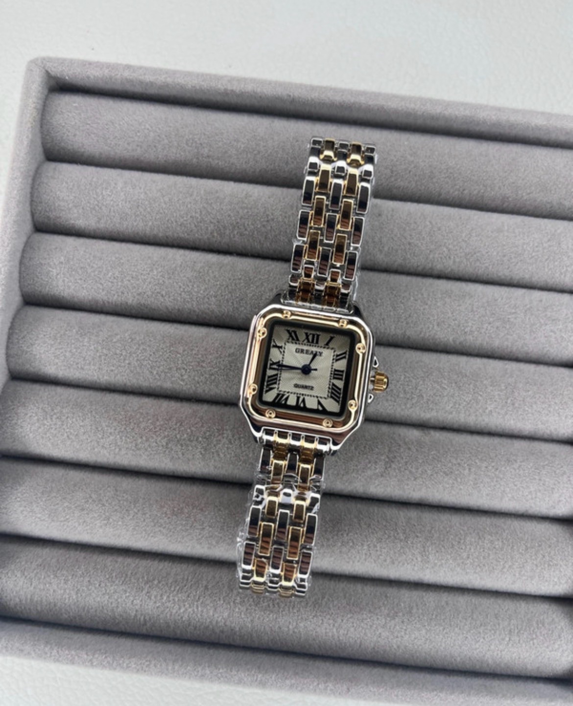 Silver and gold quartz watch