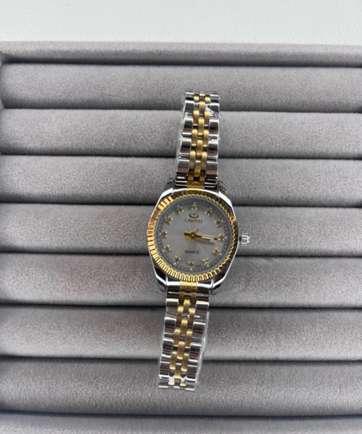 New silver and gold watch