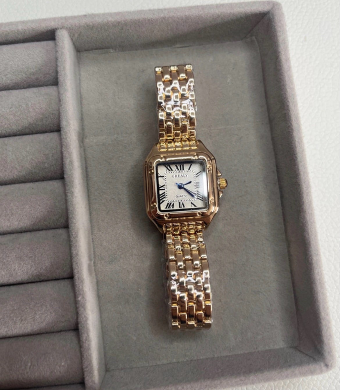 New gold and white quartz watch