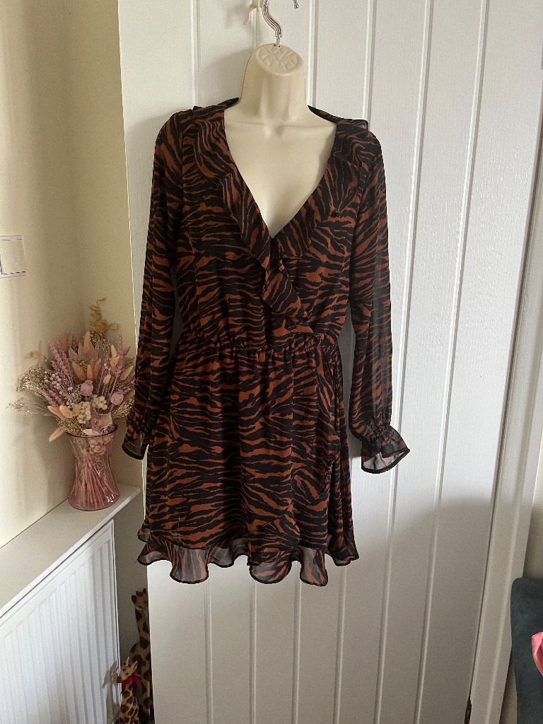 Brown Tiger Print ruffled mini dress with long sheer sleeves size 10 H&M