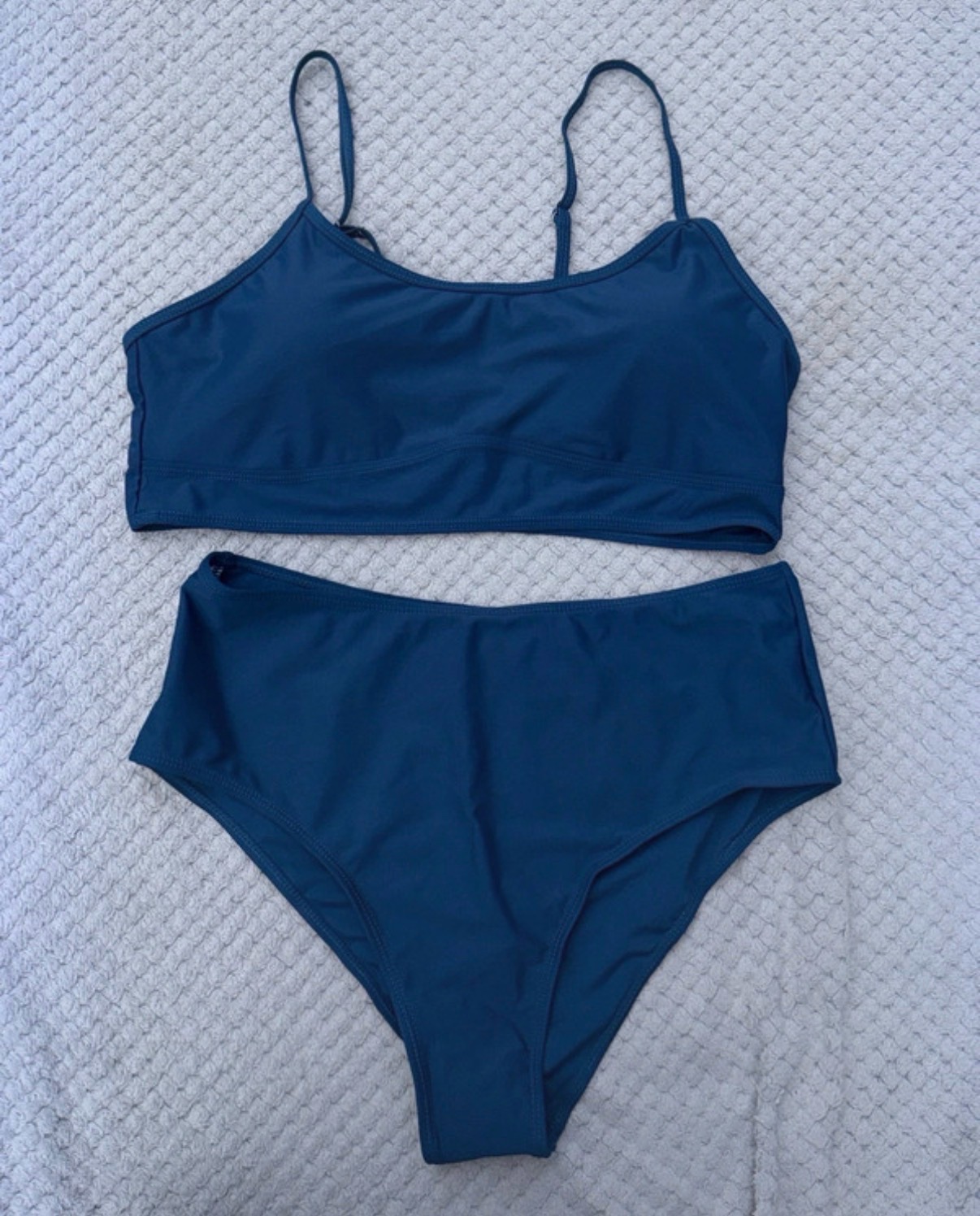 Women’s blue/navy blue bikini top & bottom set.