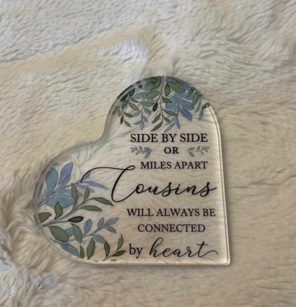 ‘Side by side or miles apart cousin will always be connected by heart’ sign