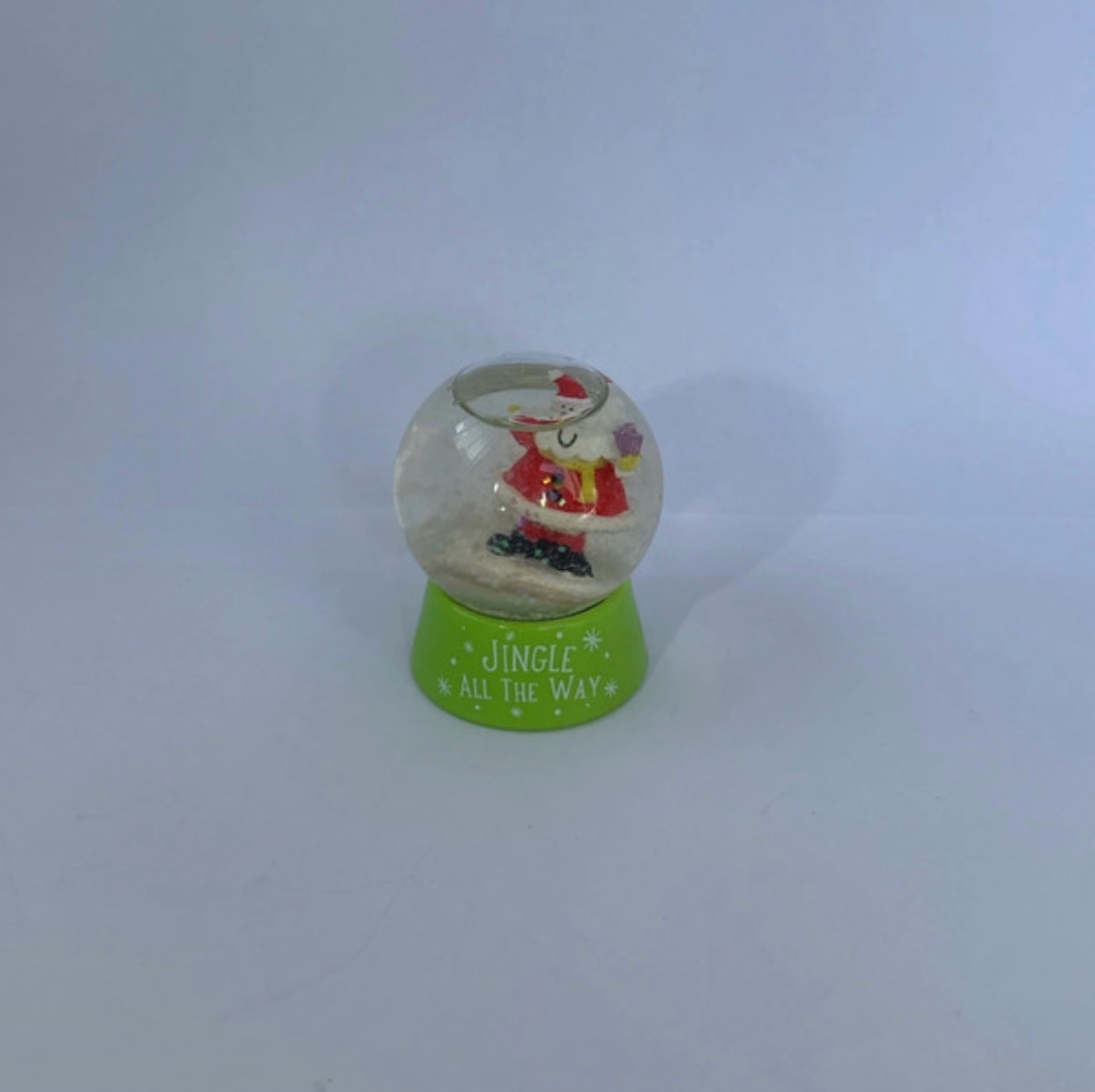 Green Santa snow globe