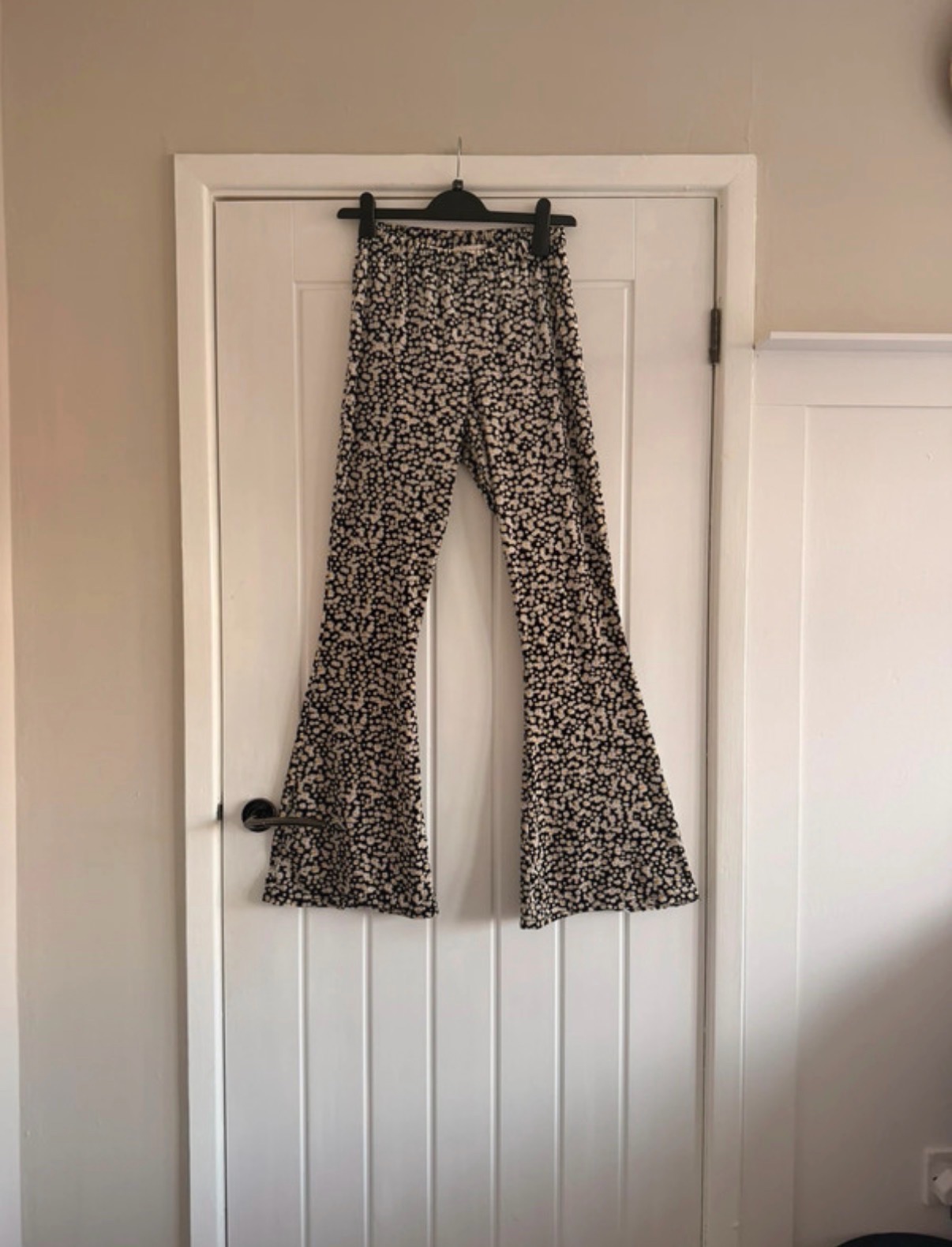 Urban renewal floral flared trousers size medium