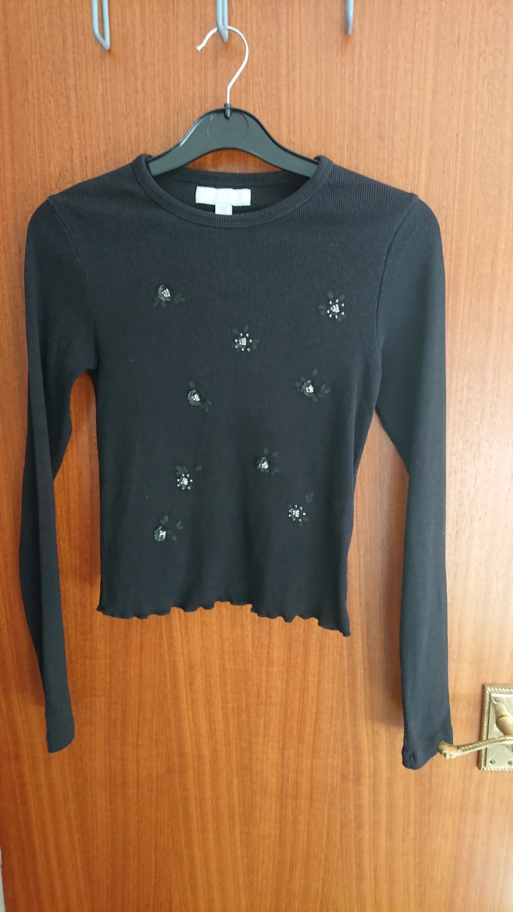 Girl's black long sleeve top. Age 13 - 14