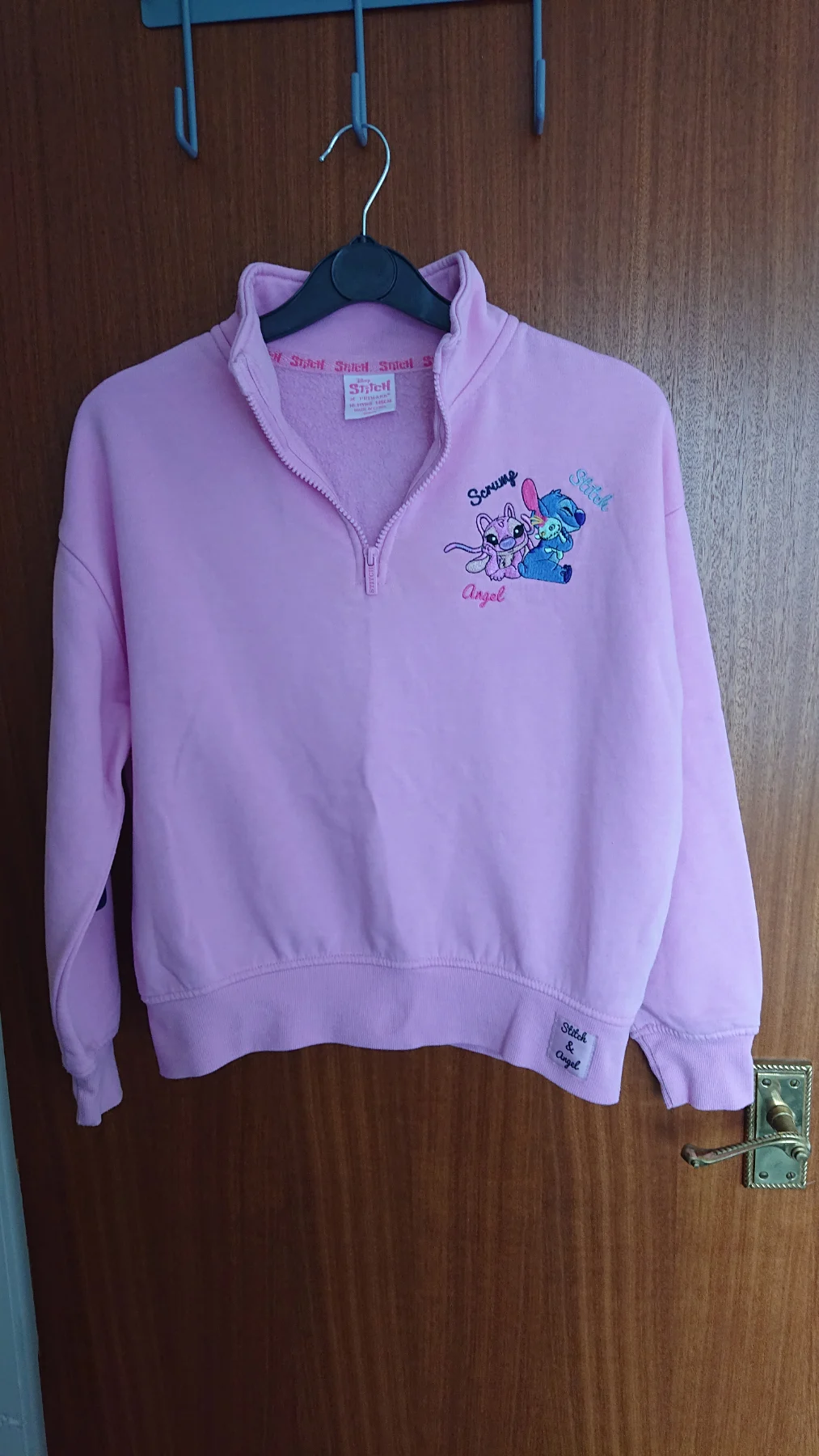 Girl's pink Stitch and Angel sweatshirt. Age 10-11