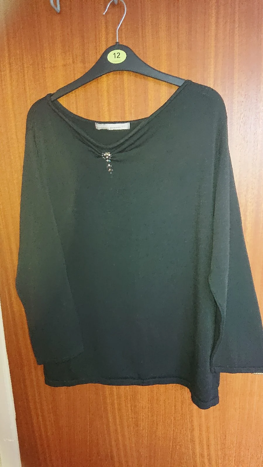 Black 3/4 sleeve stretchy top. Size 20
