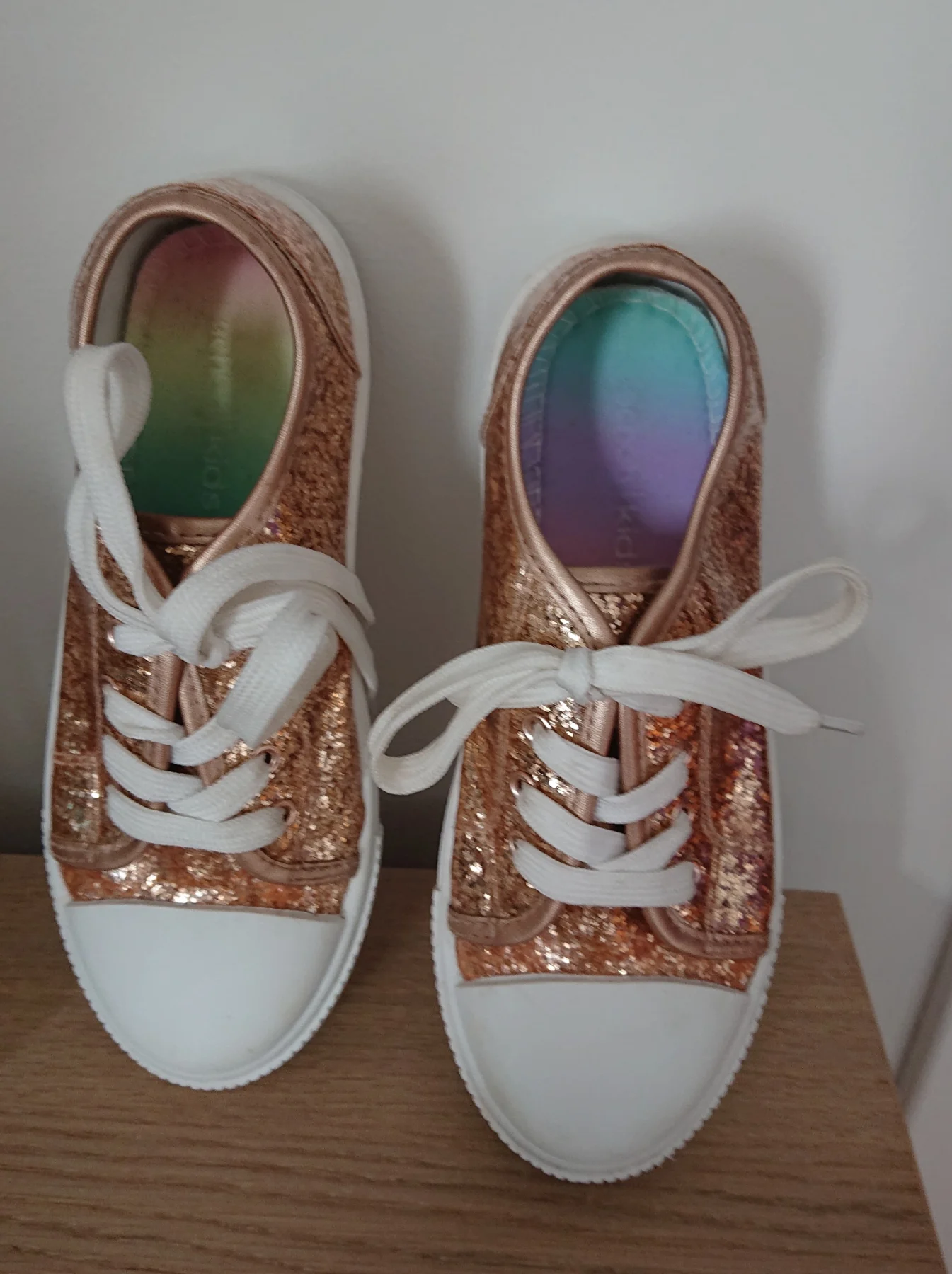 Girl's gold d trainers. Size junior 13