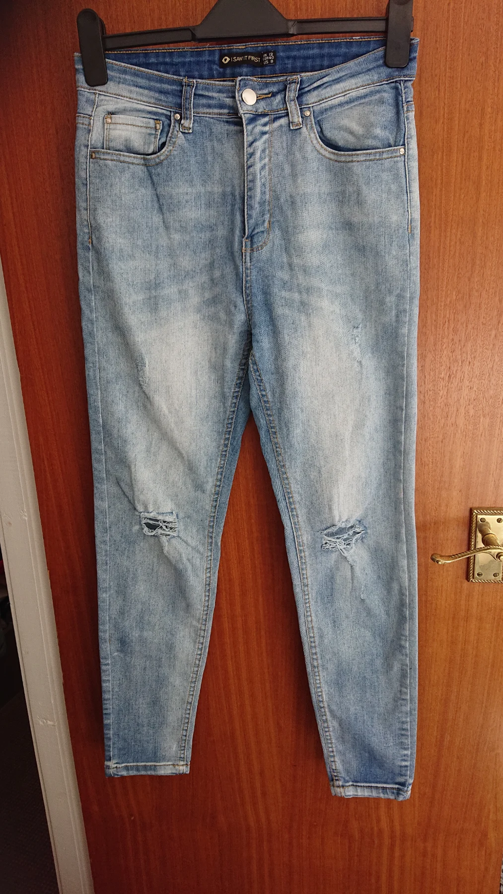 Faded, ripped skinny jeans. Size 12