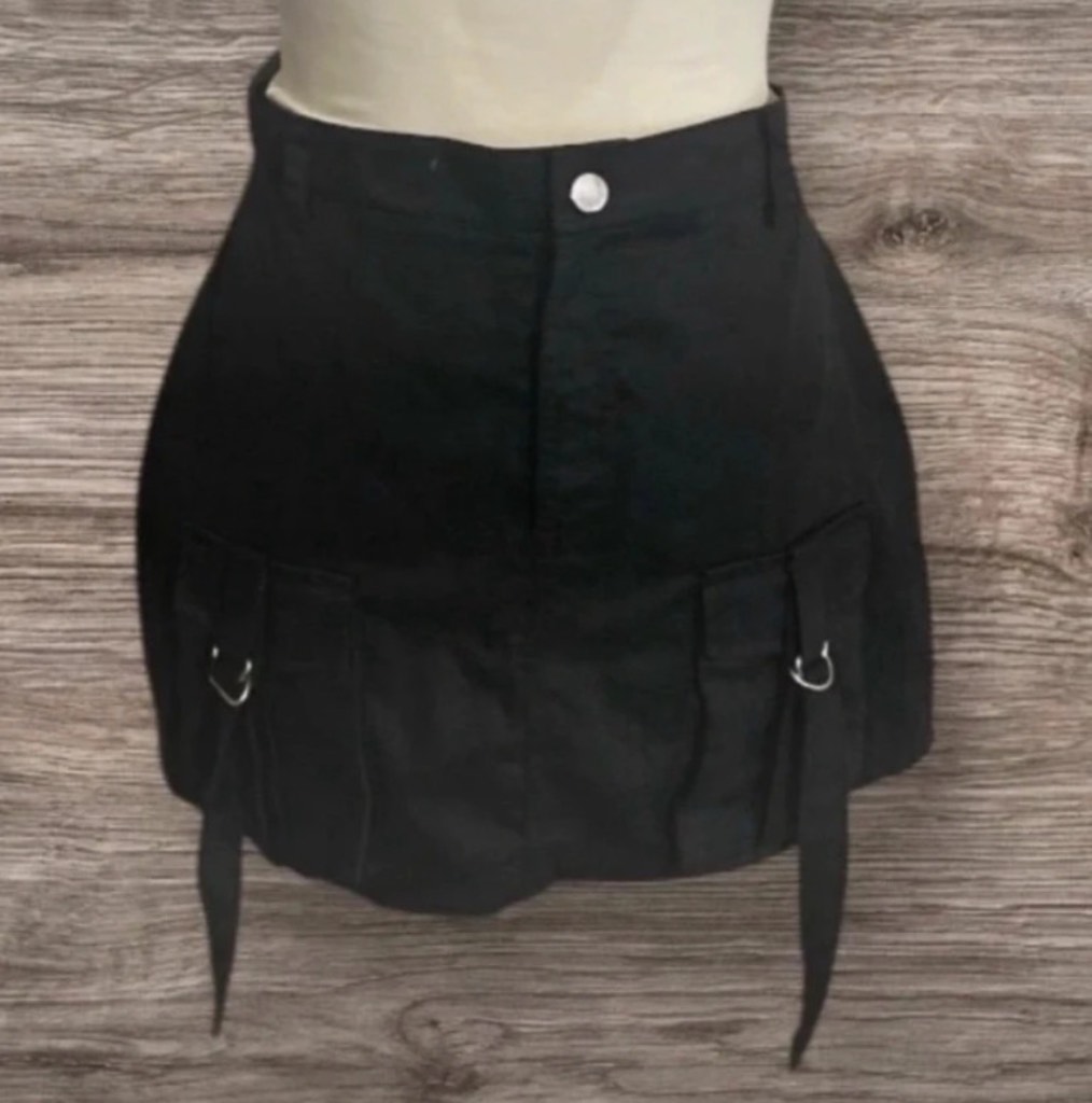 New Ego black cotton miniskirt in size 12, front pockets, Machine washable cotton