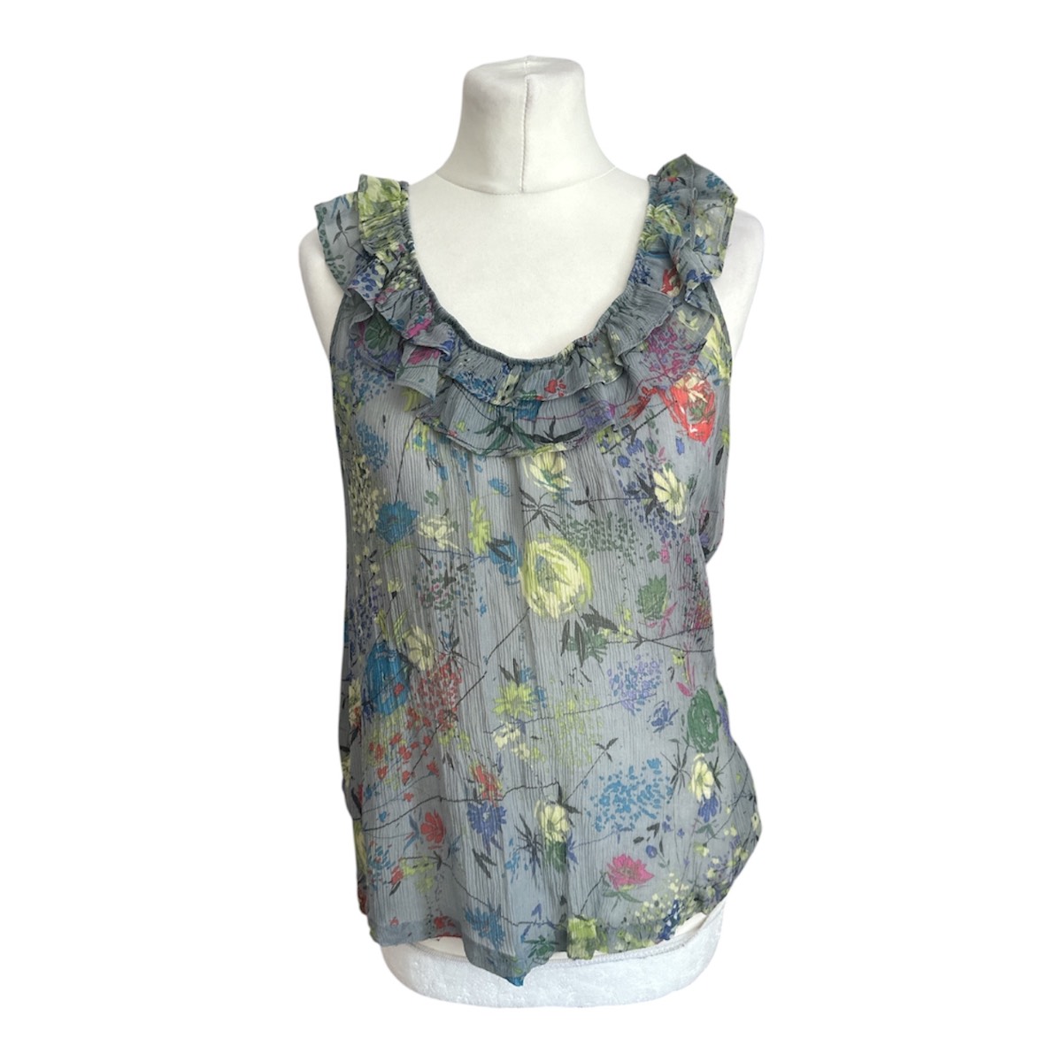 Petticoat Alley On/Off Shoulder 100% Silk Blouse in size M measures 23” pit to pit in VGC.