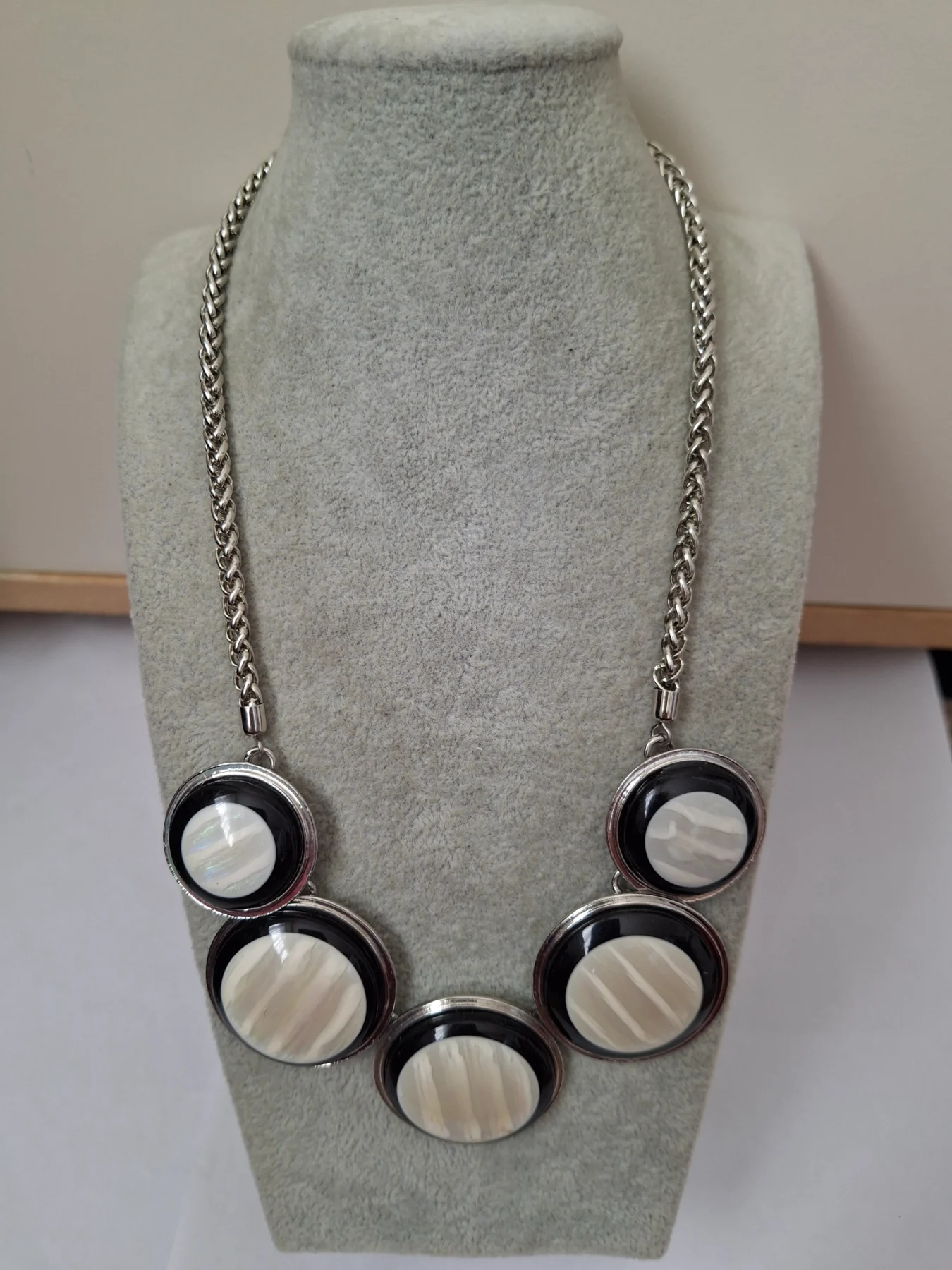 Cream and black bib style necklace