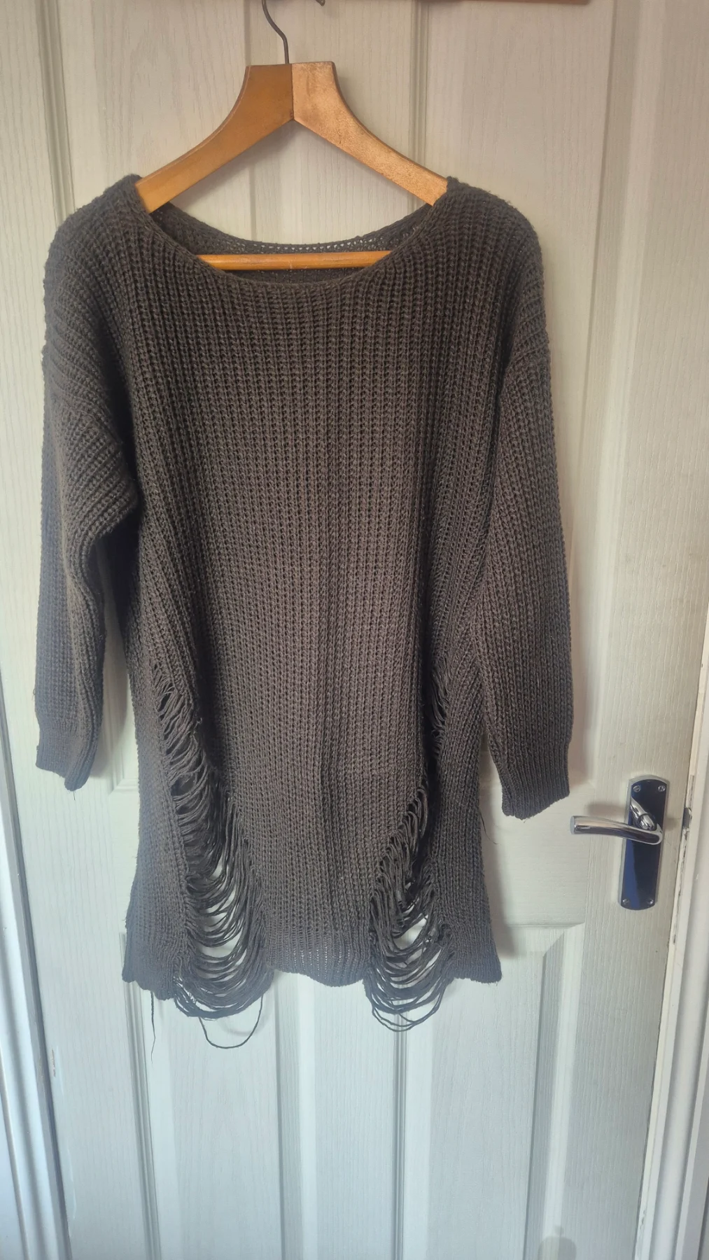 Womans frayed effect jumper