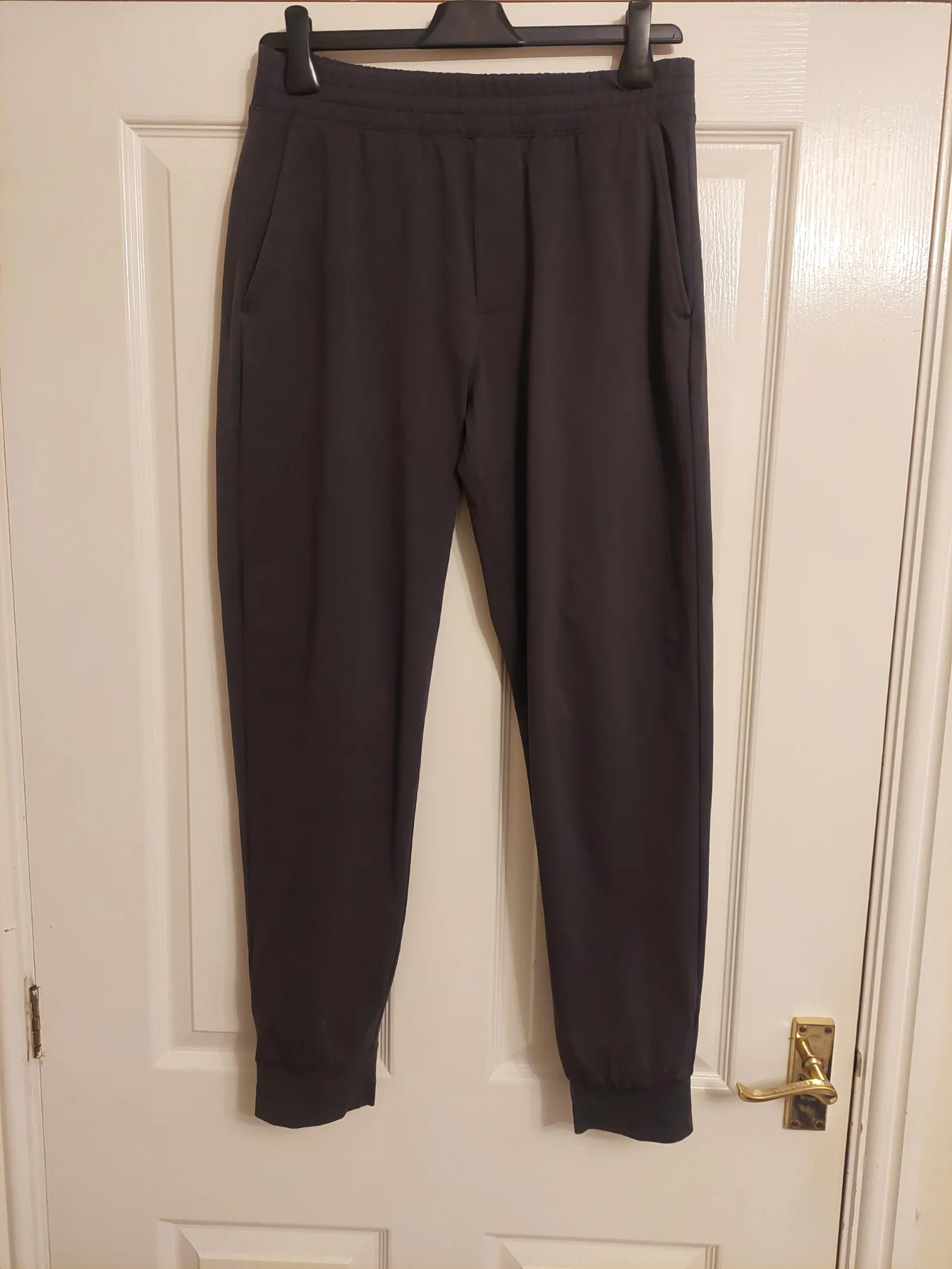 Boy's teens dark grey UniQlo joggers Size M W30"