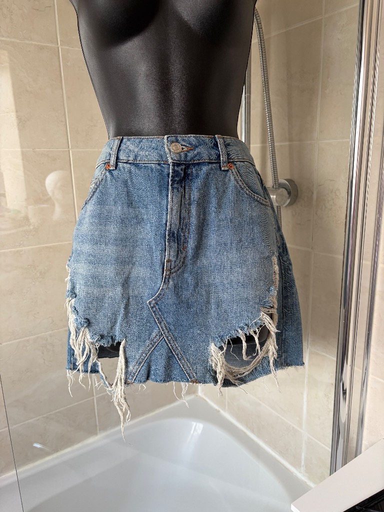 Denim distressed look mini skirt