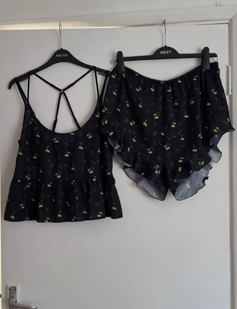 Short pajama set with a cherry print.