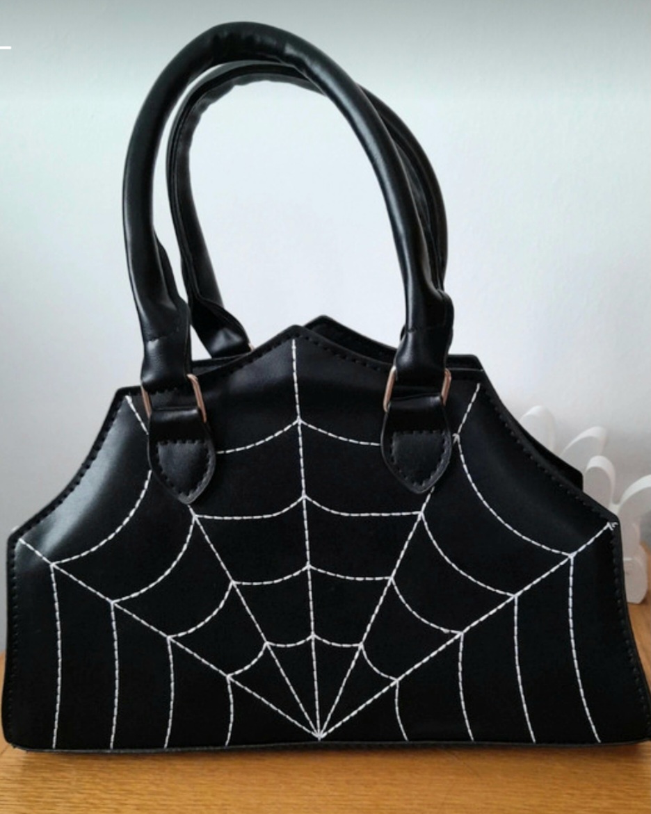Spiders Web design handbag with adjustable shoulder strap