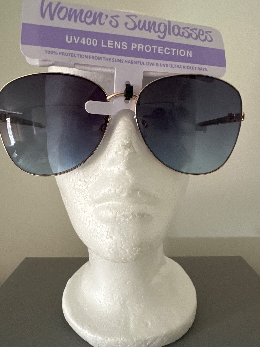 Foster Grant women’s large gold frame aviator style sunglasses