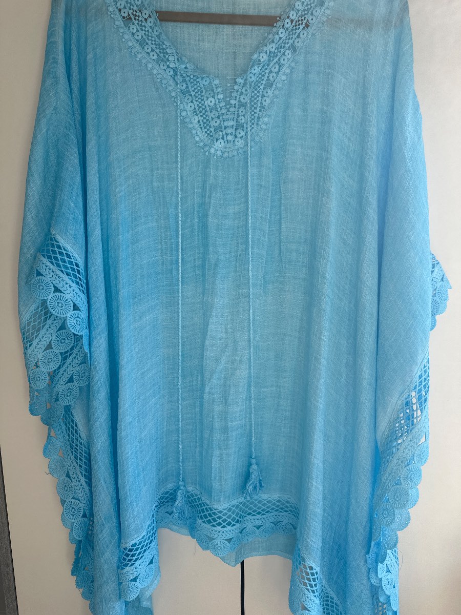 Beach cover-up with detailed panelling and tie detail at neck