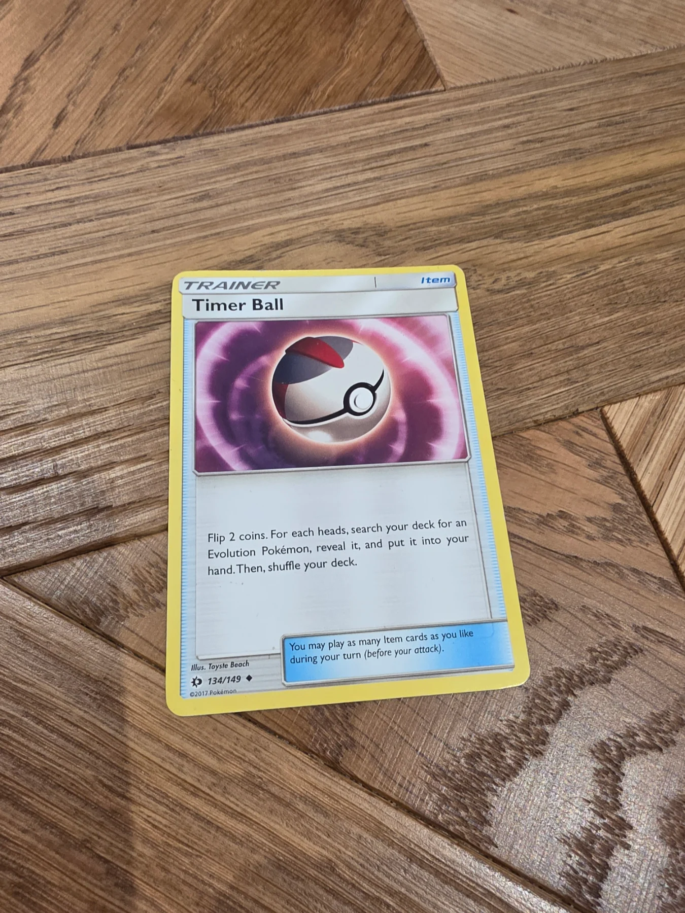 Timer Ball sun and moon base set trainer item 134/149 pokemon card